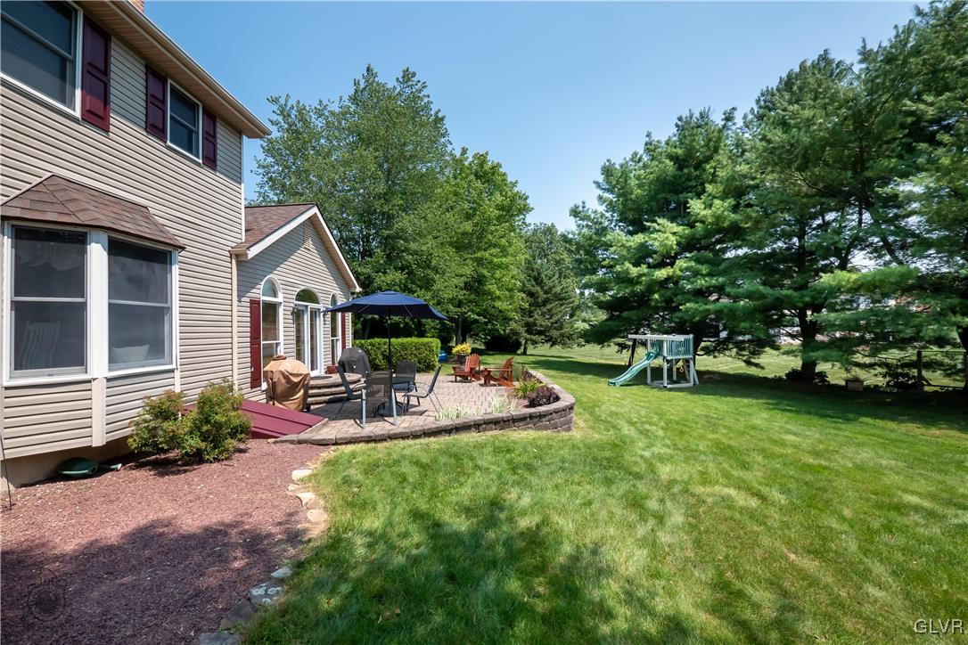 201 Ruth Road Bath, PA 18014 - Photo 43 of 49 a view of a house with backyard porch and sitting area