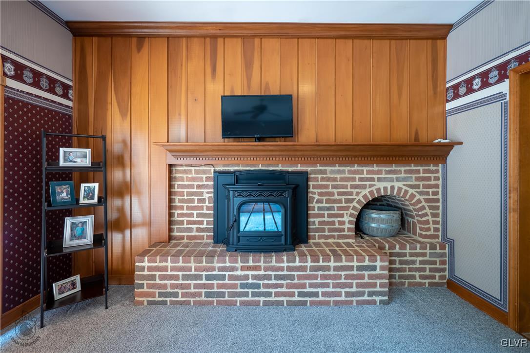 201 Ruth Road Bath, PA 18014 - Photo 49 of 49 a living room with fireplace windows and flat screen tv