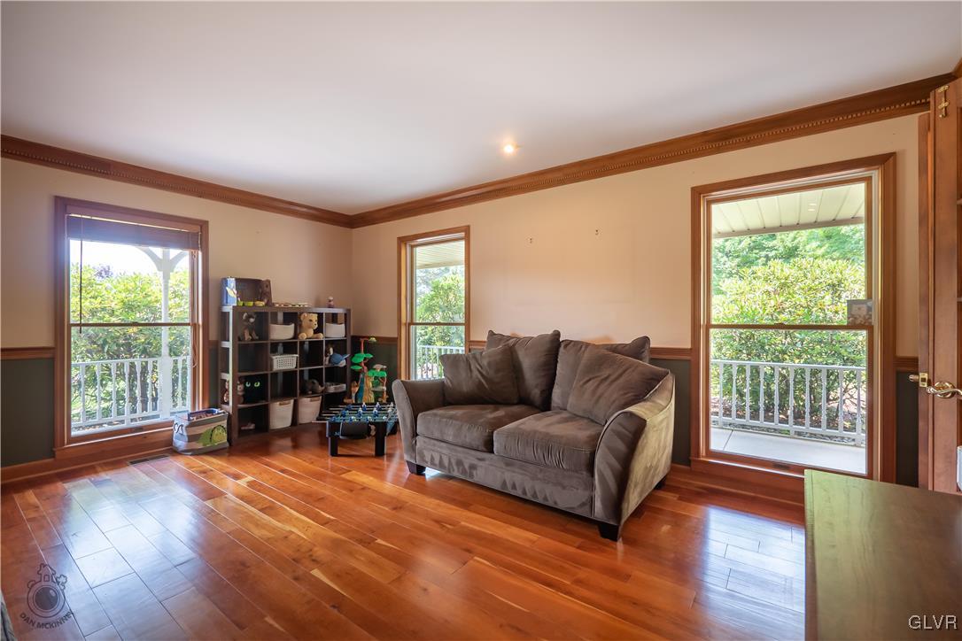 201 Ruth Road Bath, PA 18014 - Photo 7 of 49 a living room with furniture and a wooden floor