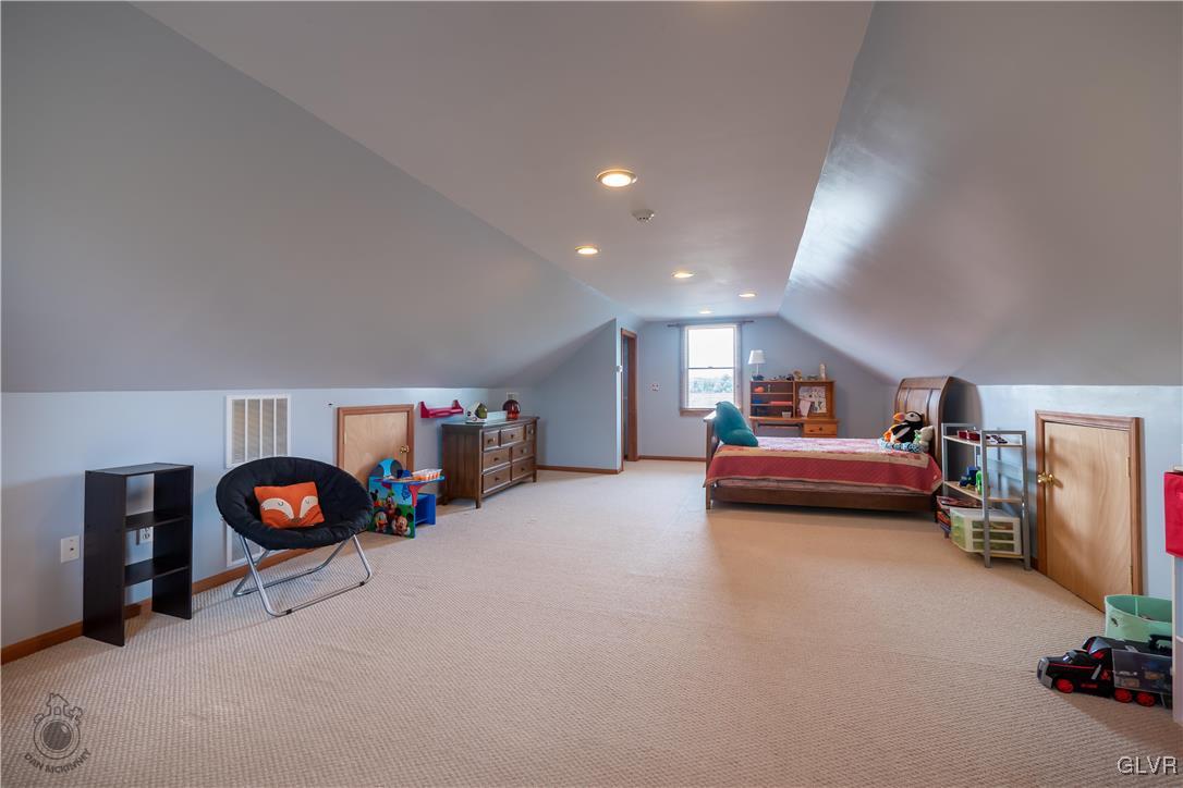 201 Ruth Road Bath, PA 18014 - Photo 10 of 49 a view of a livingroom with furniture and a ceiling fan