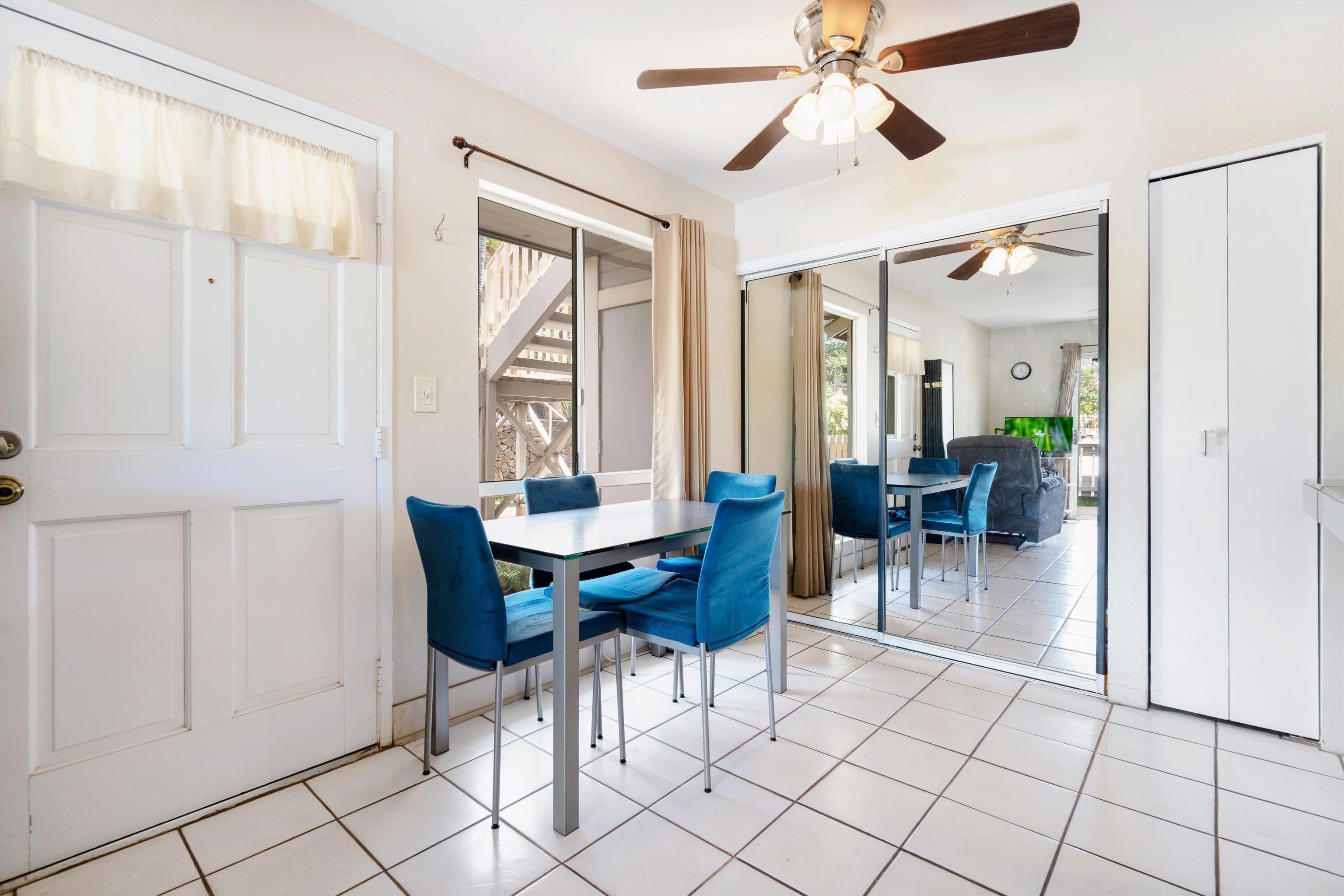 140 Uwapo Road, Unit 19105 Kihei, HI 96753 - Photo 2 of 42 a view of a livingroom with furniture and a table wooden floor