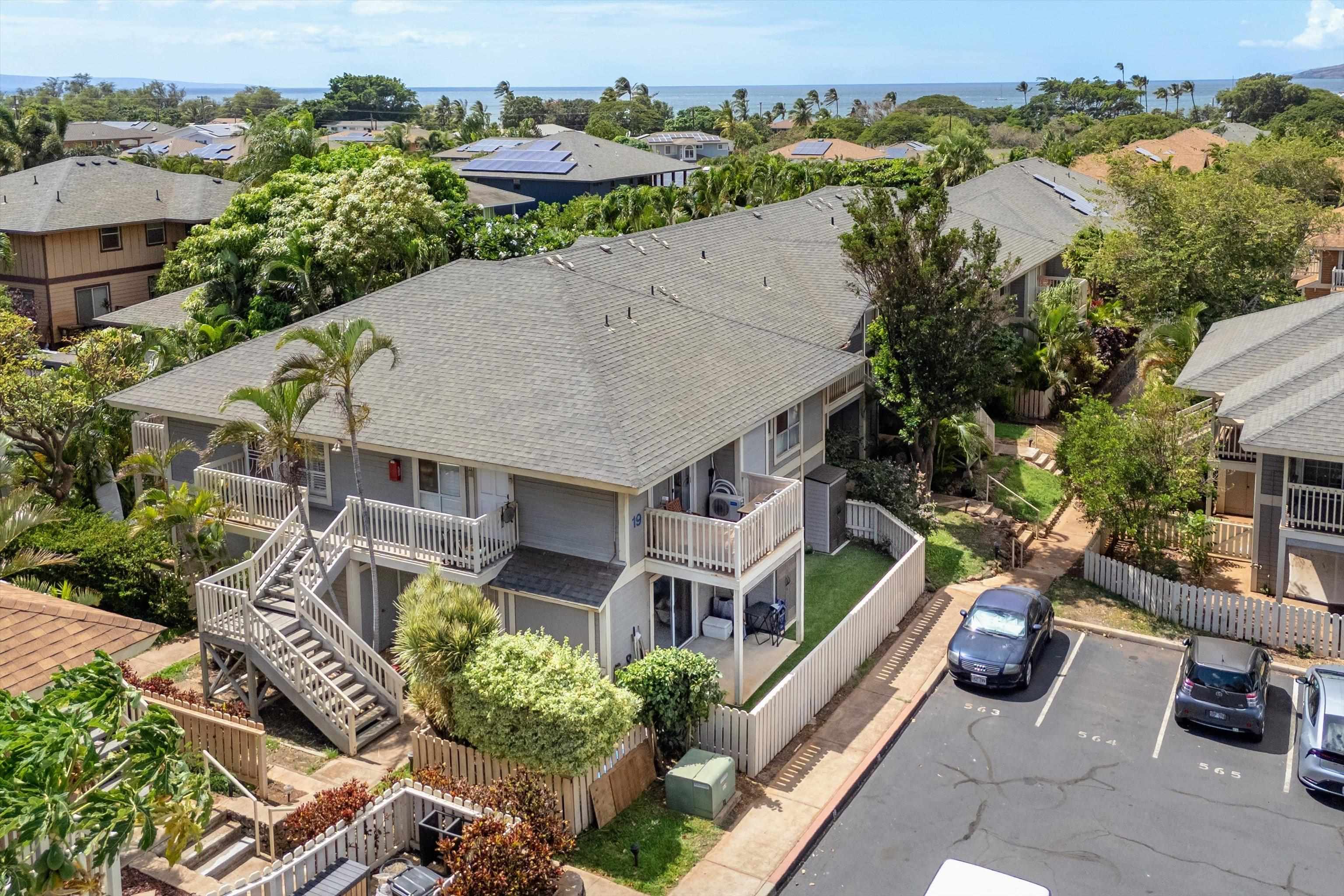 140 Uwapo Road, Unit 19105 Kihei, HI 96753 - Photo 28 of 42 an aerial view of a house with outdoor space