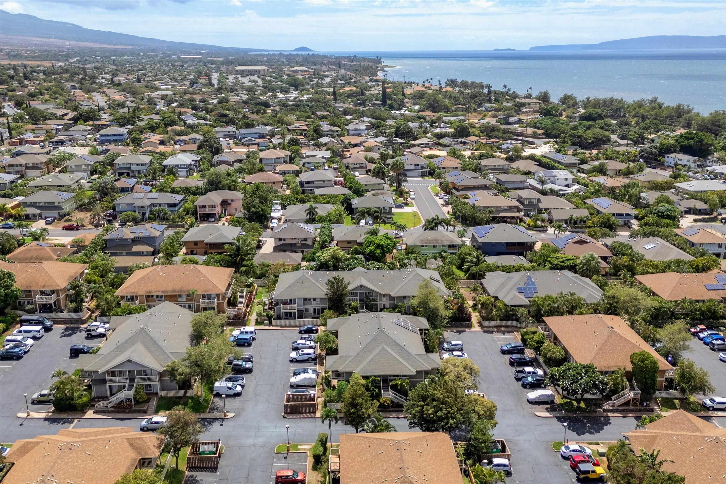140 Uwapo Road, Unit 19105 Kihei, HI 96753 - Photo 38 of 42 an aerial view of a city with lots of residential buildings