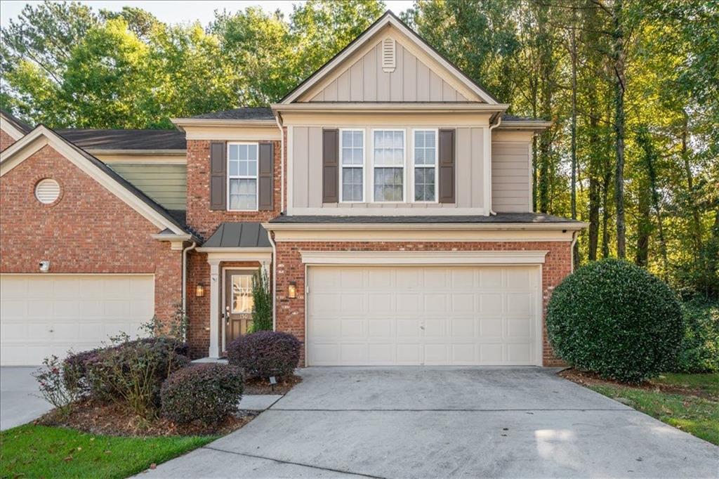 5800 Oakdale Road Southeast, Unit 150 Mableton, GA 30126 - Photo 1 of 36 a view of a house with a yard