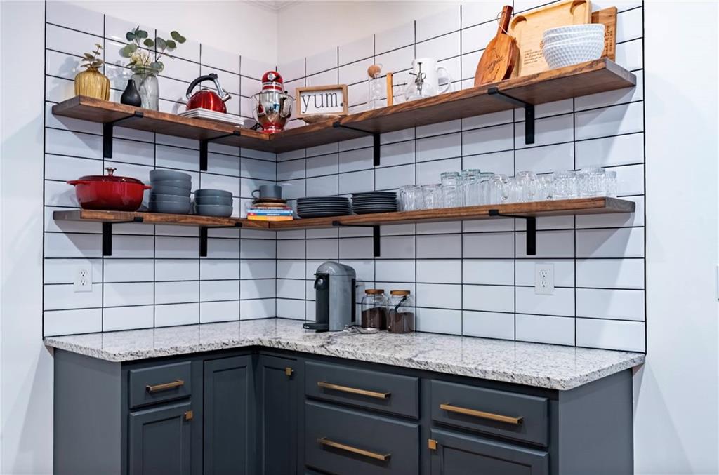5800 Oakdale Road Southeast, Unit 150 Mableton, GA 30126 - Photo 13 of 36 a kitchen with stainless steel appliances granite countertop a sink and cabinets