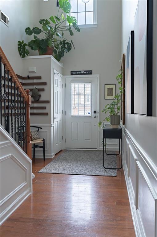 5800 Oakdale Road Southeast, Unit 150 Mableton, GA 30126 - Photo 15 of 36 a view of an entryway with wooden floor and a potted plant