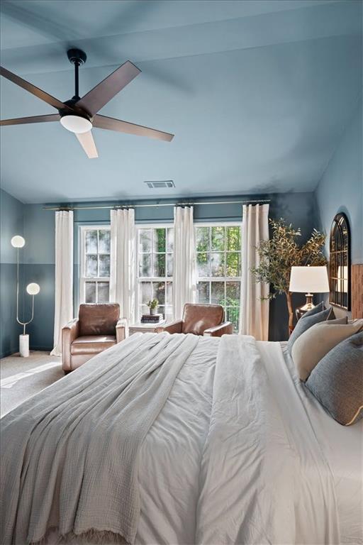 5800 Oakdale Road Southeast, Unit 150 Mableton, GA 30126 - Photo 17 of 36 a bedroom with a large bed and a large window