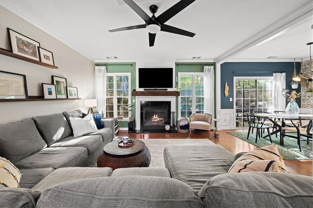 5800 Oakdale Road Southeast, Unit 150 Mableton, GA 30126 - Photo 2 of 36 a living room with furniture a fireplace and a flat screen tv