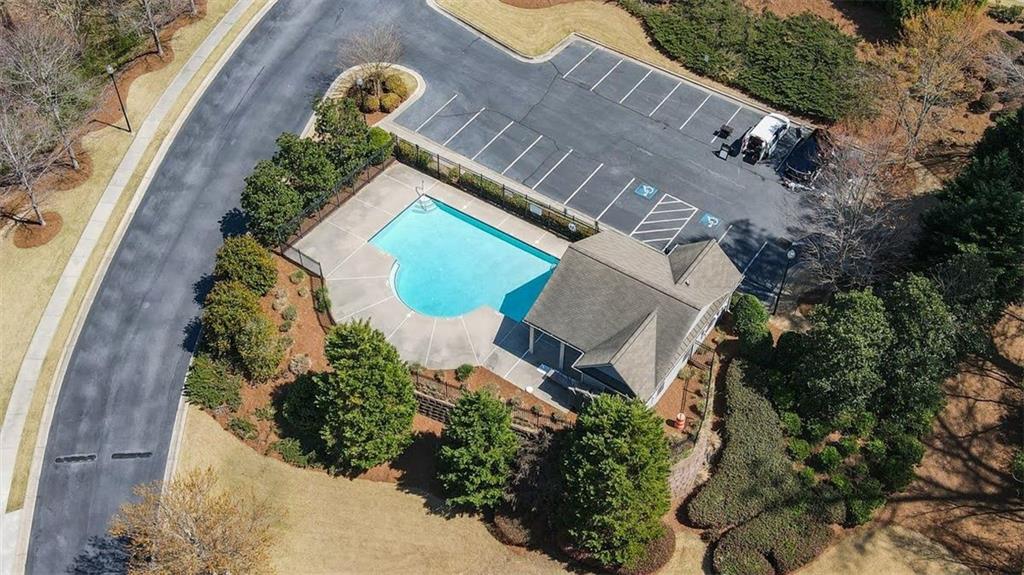 5800 Oakdale Road Southeast, Unit 150 Mableton, GA 30126 - Photo 31 of 36 an aerial view of a house with a yard and garden