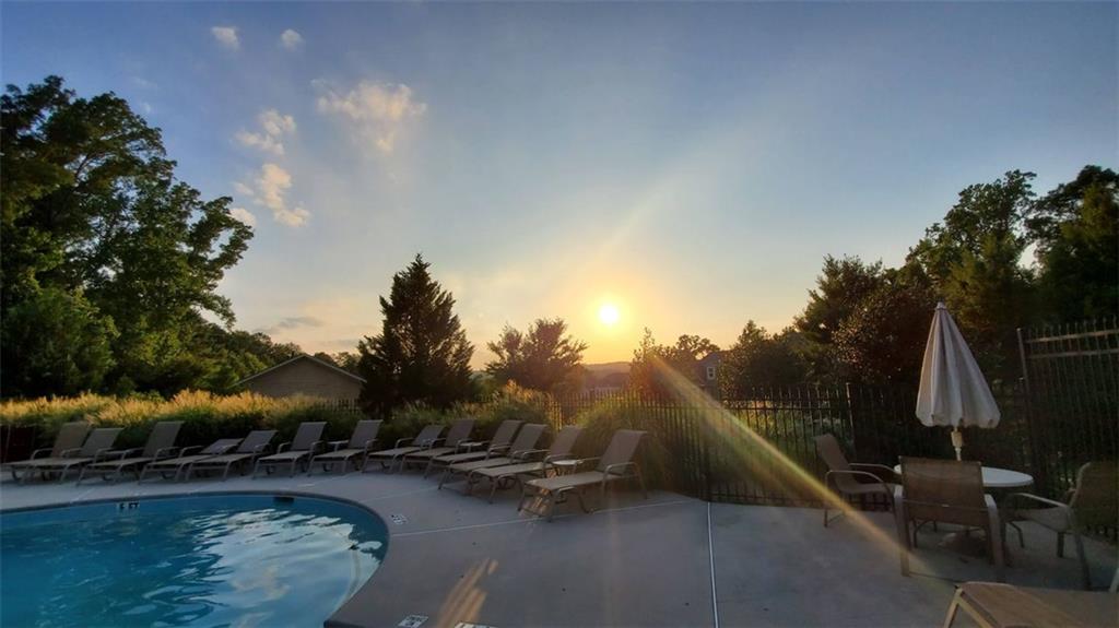5800 Oakdale Road Southeast, Unit 150 Mableton, GA 30126 - Photo 32 of 36 a view of a swimming pool and outdoor space