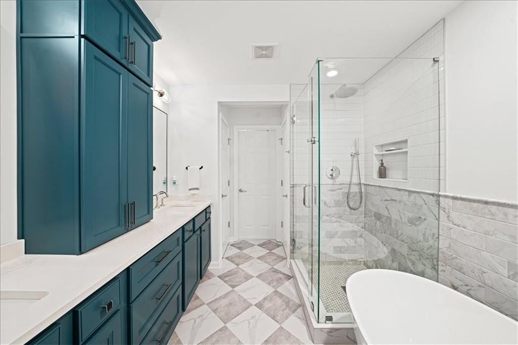 5800 Oakdale Road Southeast, Unit 150 Mableton, GA 30126 - Photo 5 of 36 a bathroom with a double vanity sink toilet and shower