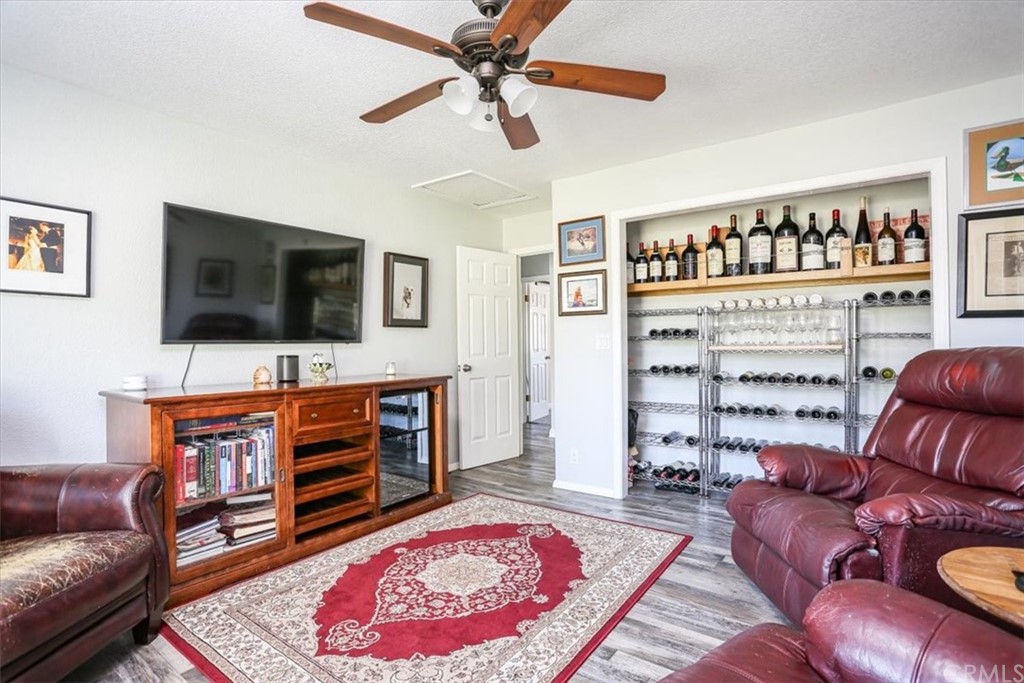 1585 Donelson Place Templeton, CA 93465 - Photo 14 of 37 a living room with furniture and a flat screen tv