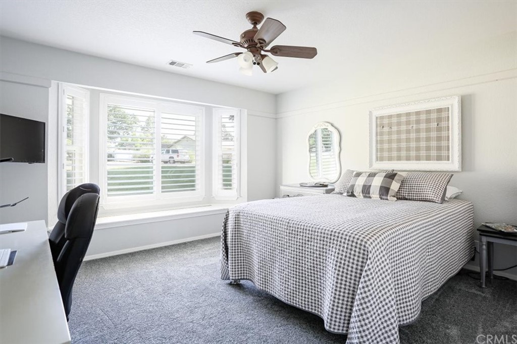 1585 Donelson Place Templeton, CA 93465 - Photo 15 of 37 a bedroom with a bed and a large window