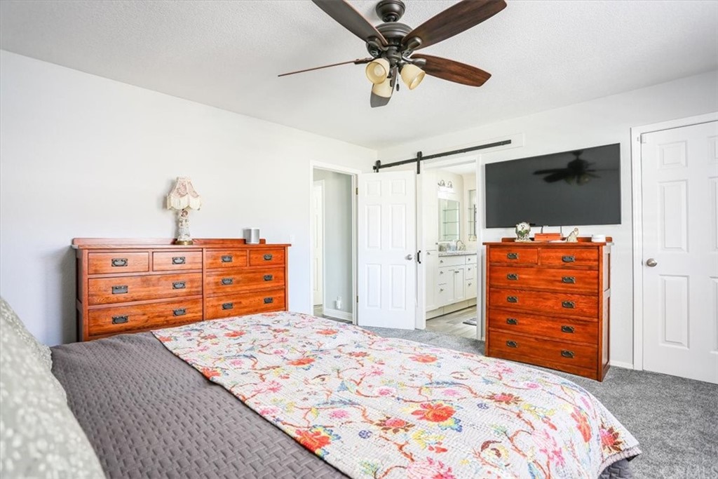 1585 Donelson Place Templeton, CA 93465 - Photo 19 of 37 a bedroom with a bed and a television