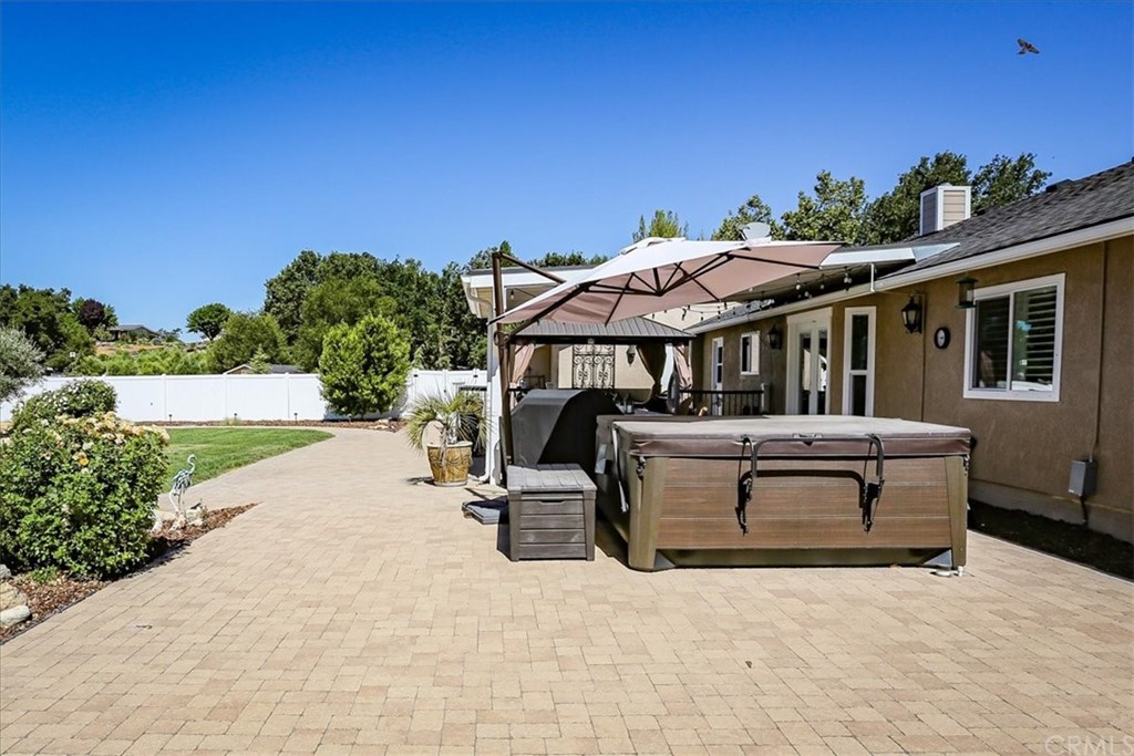 1585 Donelson Place Templeton, CA 93465 - Photo 29 of 37 a view of a white house with swimming pool in front of it