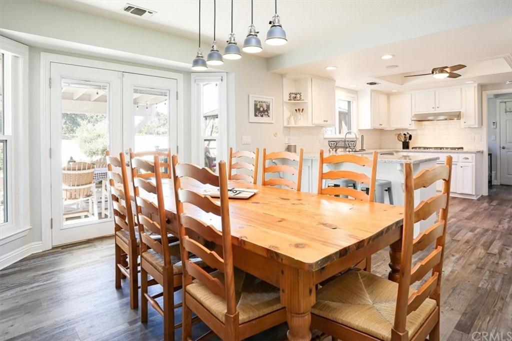 1585 Donelson Place Templeton, CA 93465 - Photo 8 of 37 a view of a dining room with furniture and wooden floor
