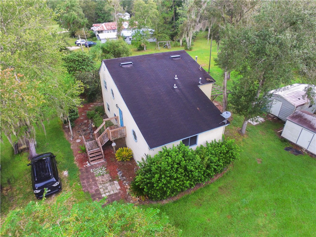 75072 Edwards Road Yulee, FL 32097 - Photo 25 of 27 an aerial view of a house with a yard