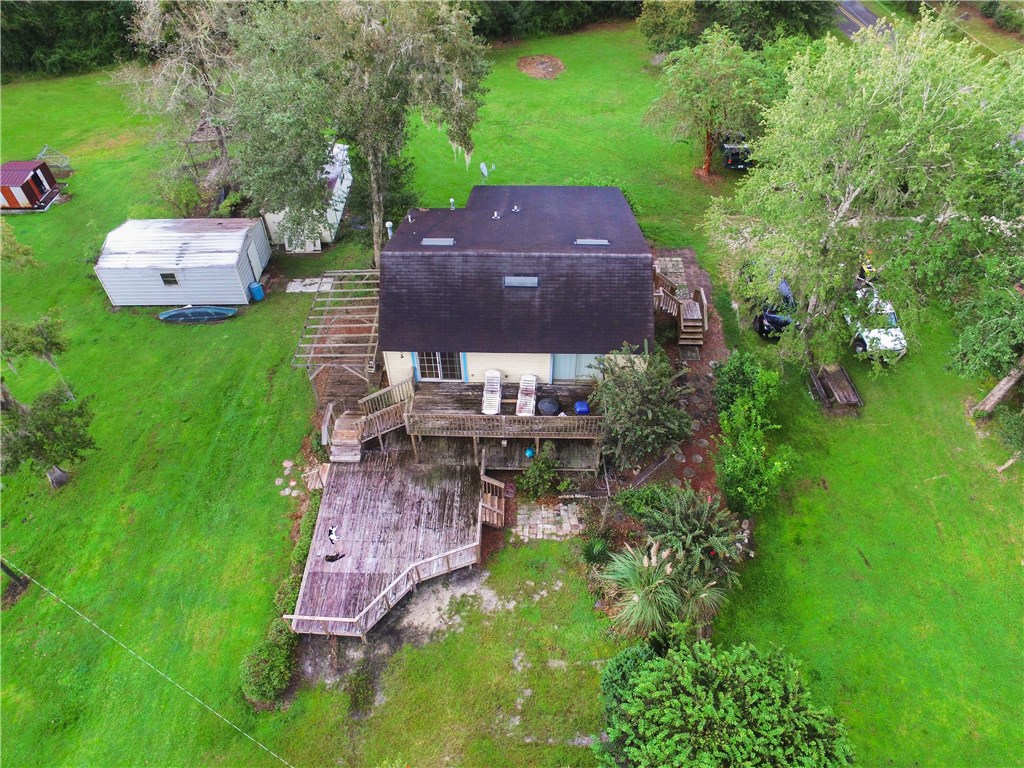 75072 Edwards Road Yulee, FL 32097 - Photo 26 of 27 an aerial view of a house with garden space lake and mountain view in back