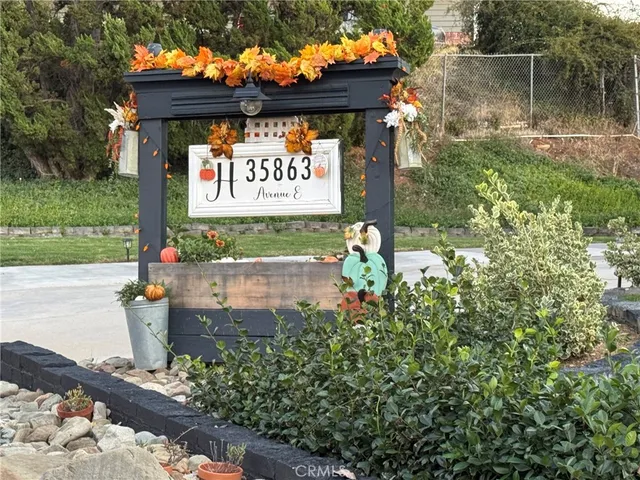 a sign that is on a tree