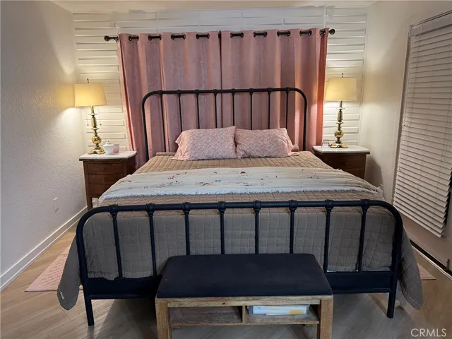 a view of a dining room with furniture and window