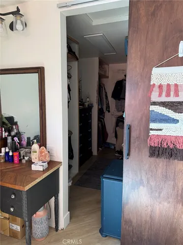 a view of a hallway and dining room