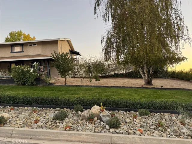a view of a house with a garden
