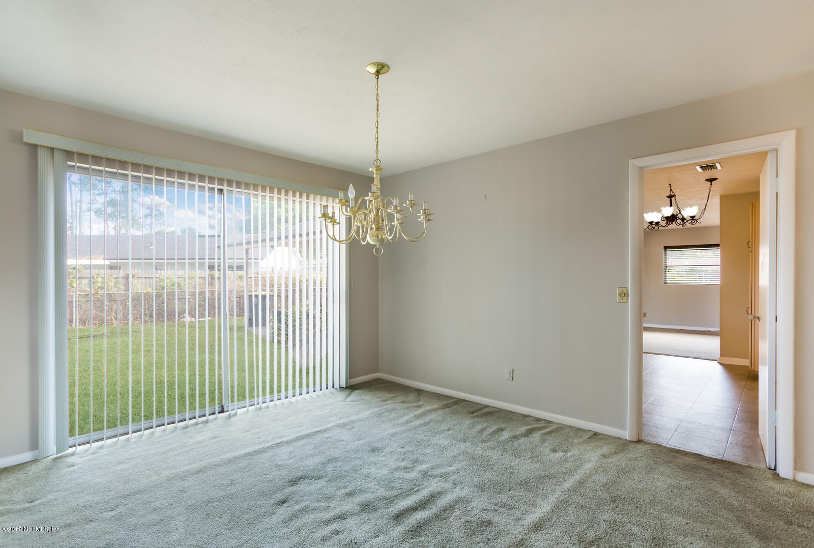 5733 Sabena Road Jacksonville, FL 32207 - Photo 14 of 25 a view of an empty room with a window