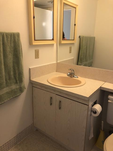 1044 Rexford Drive Boca Raton, FL 33434 - Photo 27 of 50 a bathroom with a sink and a mirror