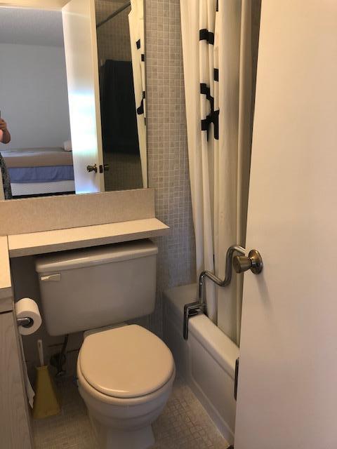 1044 Rexford Drive Boca Raton, FL 33434 - Photo 28 of 50 a bathroom with a toilet and a shower