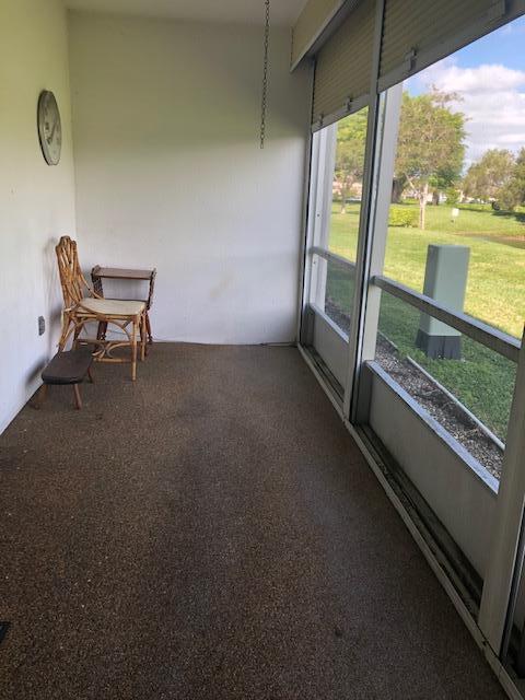 1044 Rexford Drive Boca Raton, FL 33434 - Photo 30 of 50 a view of a room with a large window