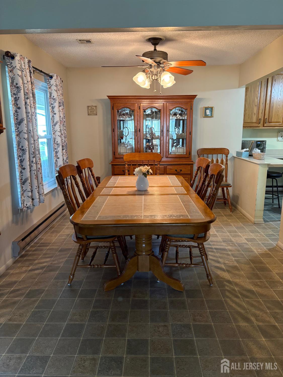 531 Ardmore Road, Unit 531A Monroe Township, NJ 08831 - Photo 2 of 5 a view of a dining room with furniture