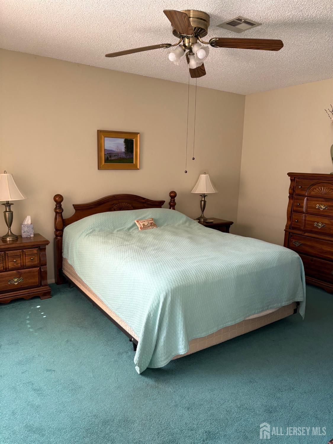 531 Ardmore Road, Unit 531A Monroe Township, NJ 08831 - Photo 5 of 5 a bedroom with a bed and ceiling fan