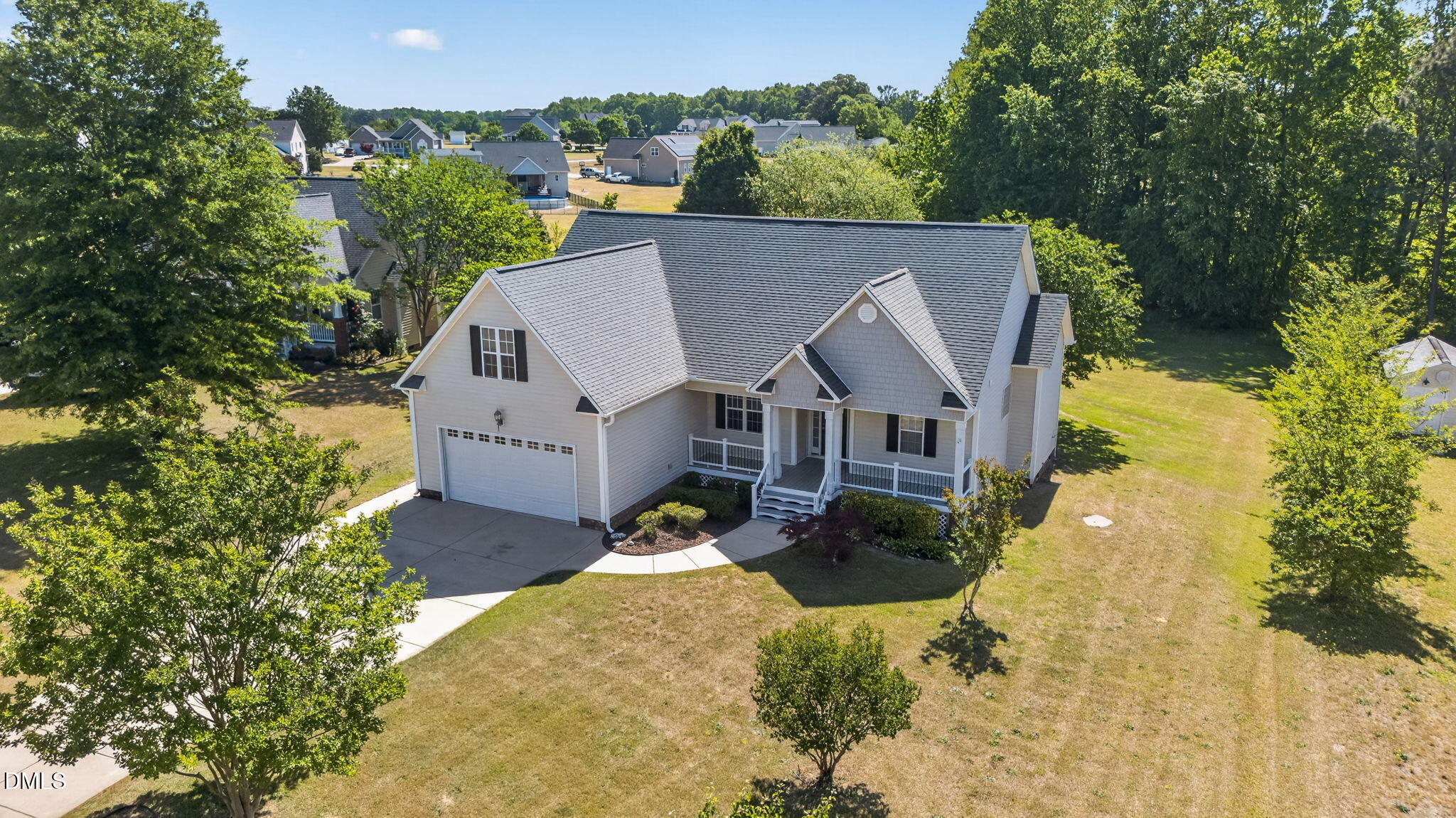 102 Ina Joe Place Willow Spring, NC 27592 - Photo 1 of 31 an aerial view of a house with a yard