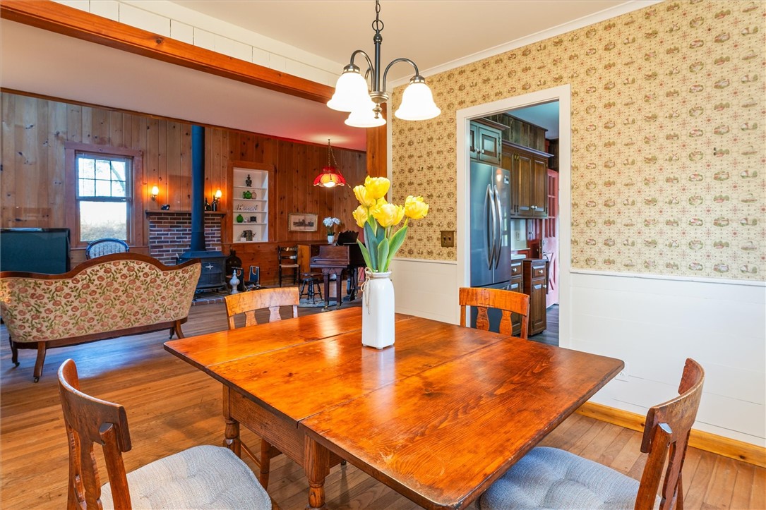 1728 Clarkson Parma Townline Road Parma, NY 14420 - Photo 14 of 50 dining room looking into living room