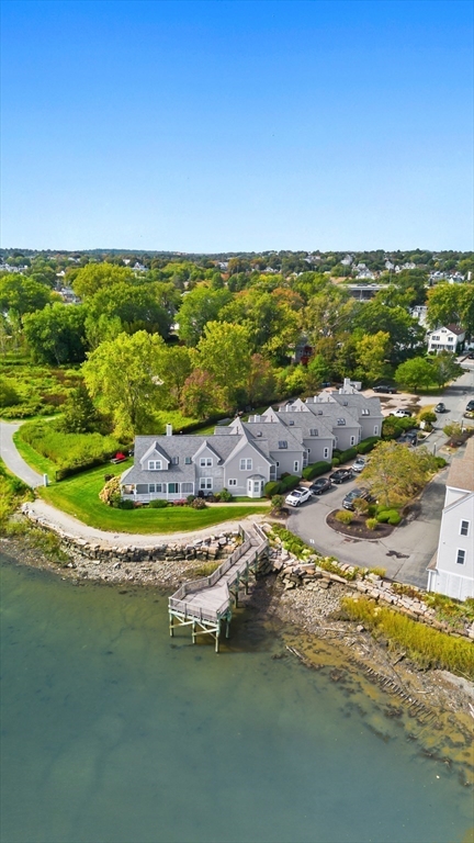 169 Walnut Street, Unit 2 Boston, MA 02122 - Photo 31 of 42 a view of a lake with a big yard