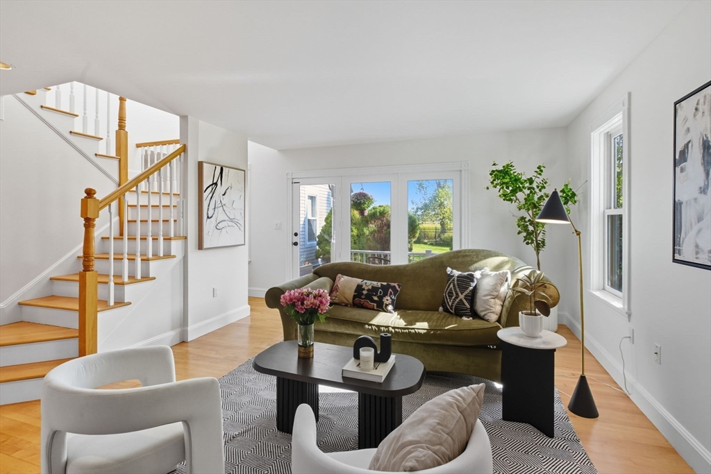 169 Walnut Street, Unit 2 Boston, MA 02122 - Photo 5 of 42 a living room with furniture and a potted plant