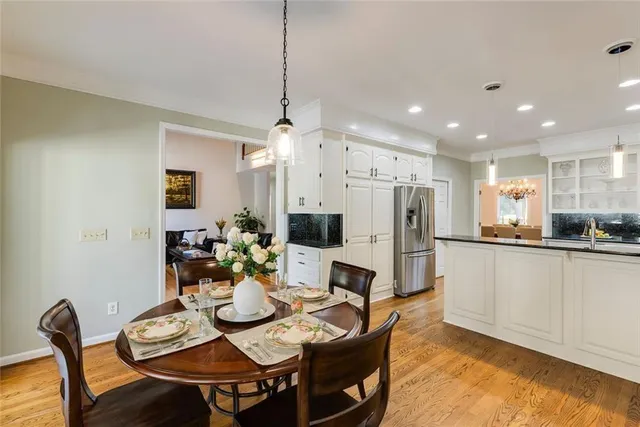 a view of a swimming pool with a yard