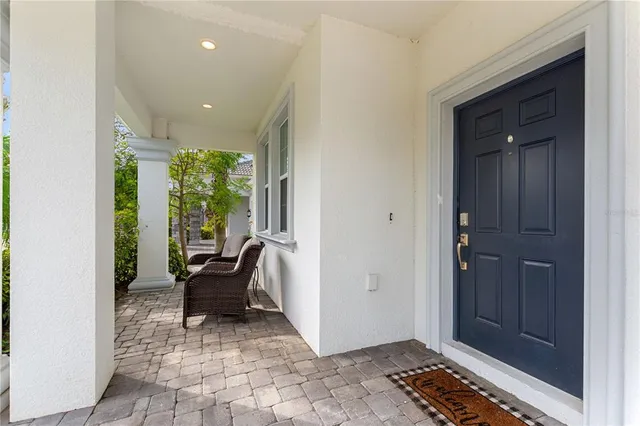 a view of workspace with furniture and window