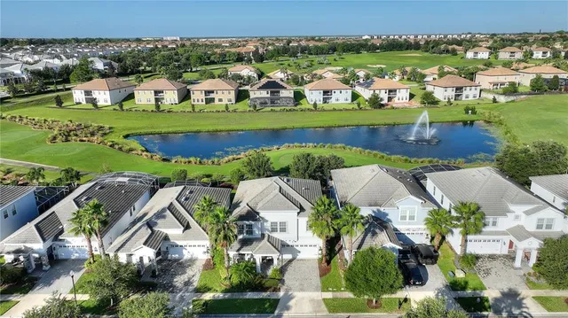 an aerial view of a house with a garden