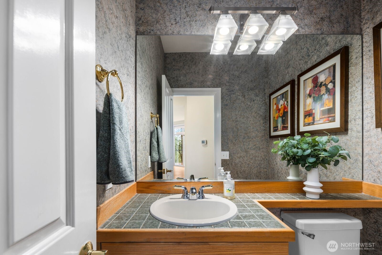 3429 Lincoln Avenue Northeast Renton, WA 98056 - Photo 19 of 40 a bathroom with a sink and a mirror