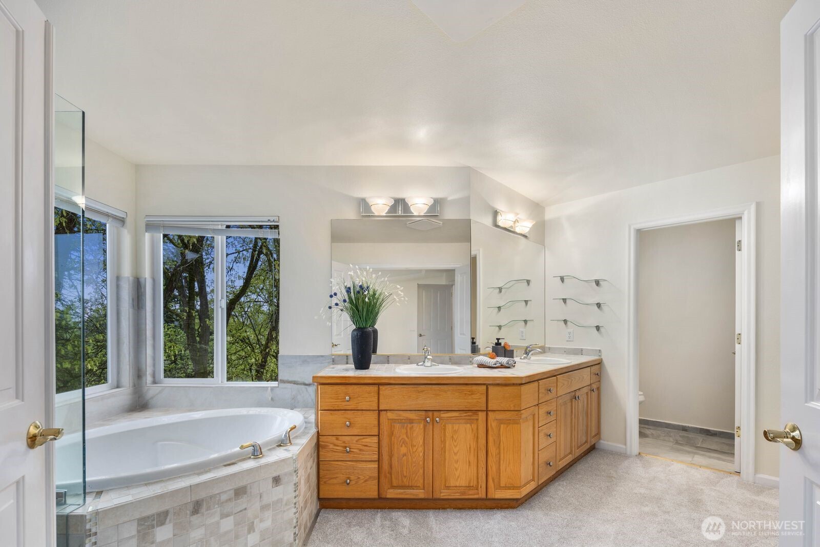 3429 Lincoln Avenue Northeast Renton, WA 98056 - Photo 23 of 40 a bathroom with sink bathtub and mirror