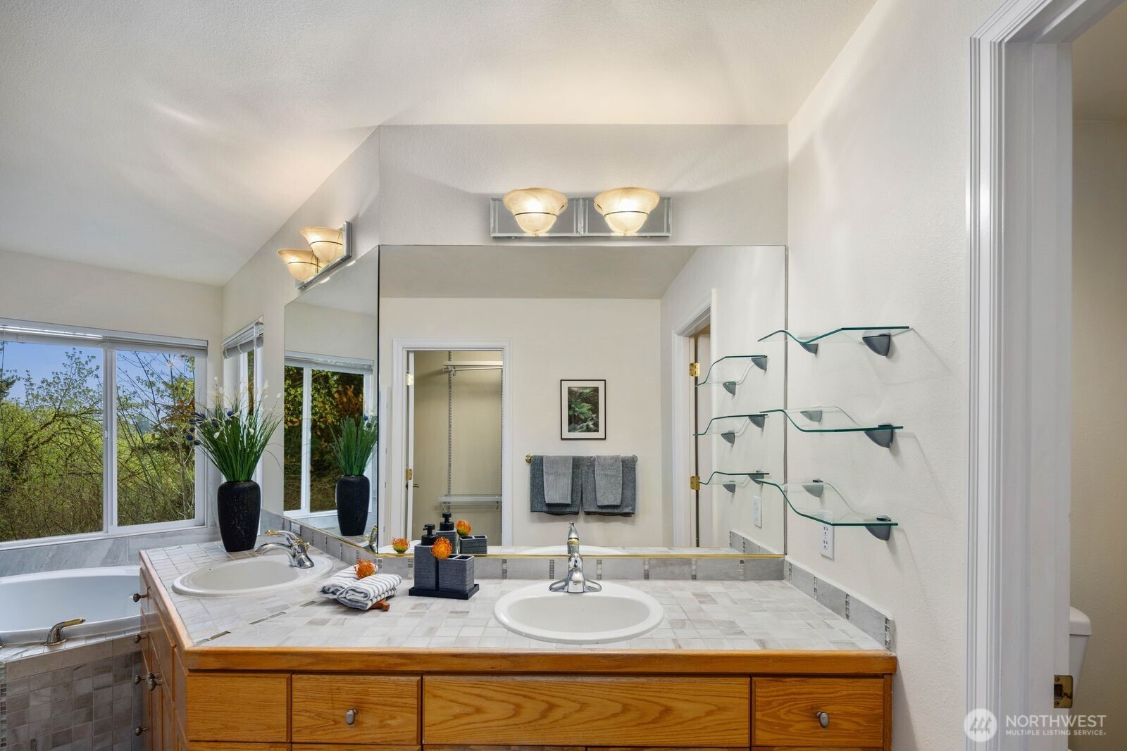 3429 Lincoln Avenue Northeast Renton, WA 98056 - Photo 25 of 40 a bathroom with a sink and a mirror