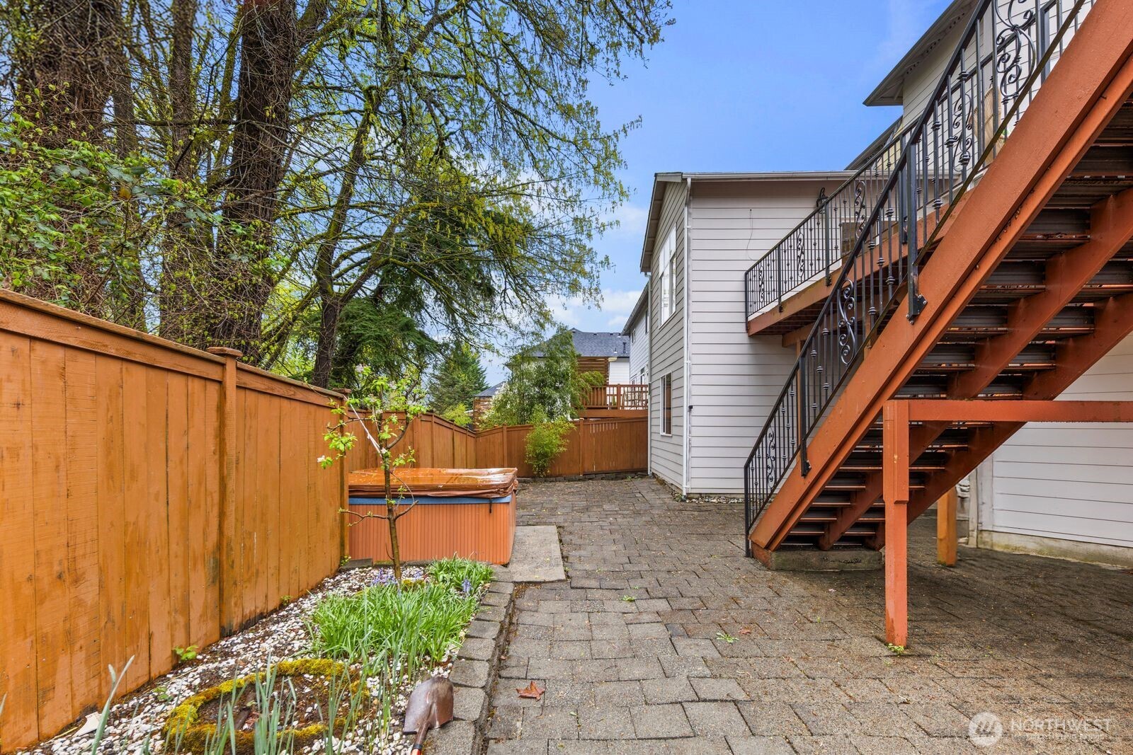 3429 Lincoln Avenue Northeast Renton, WA 98056 - Photo 40 of 40 a backyard of a house with table and chairs