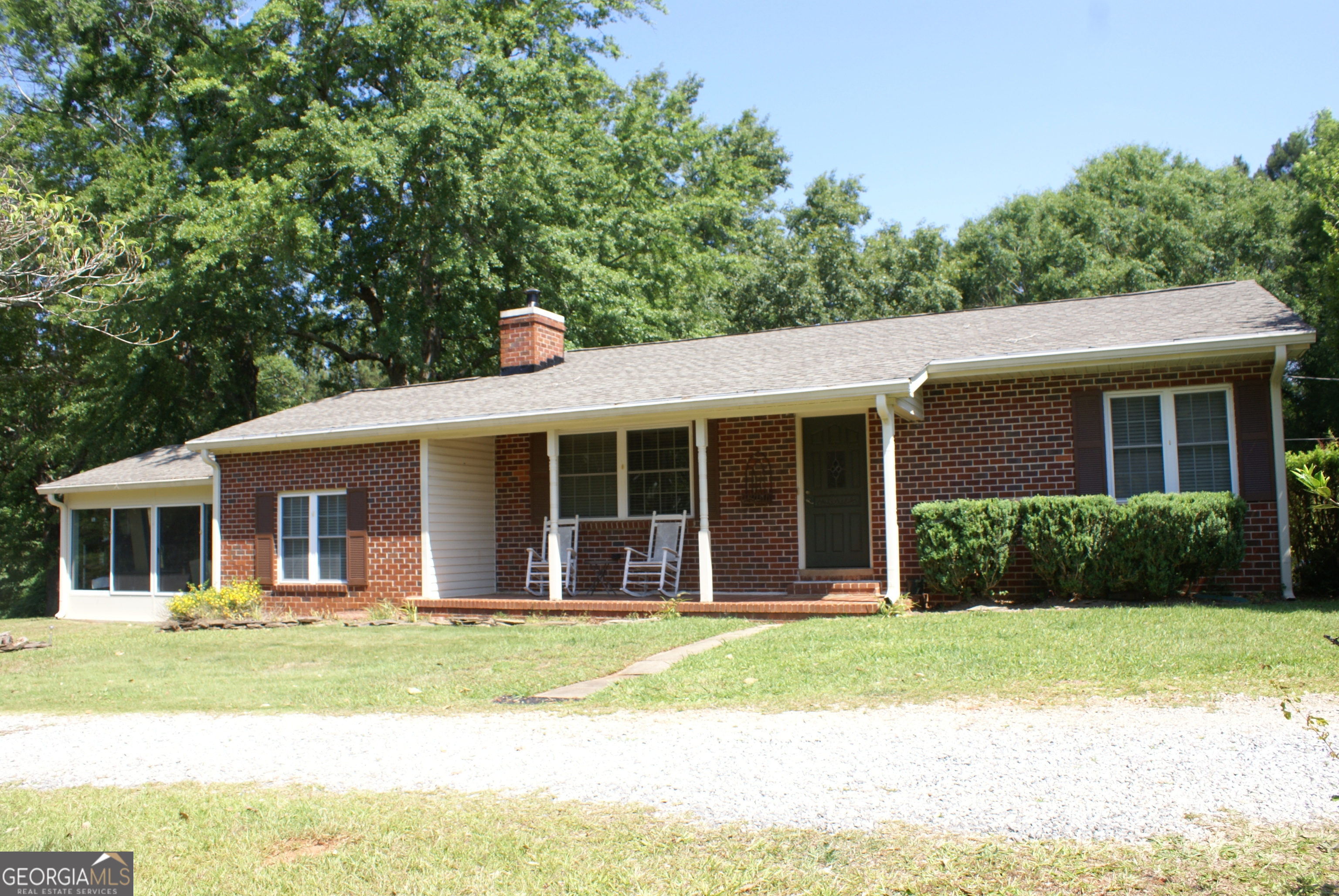 1591 Waymanville Road Thomaston, GA 30286 - Photo 2 of 24 a house view with a garden space