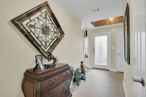 a view of a kitchen and dining room