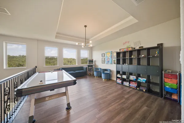 a room with furniture and a wooden floor