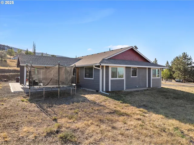 a view of a swimming pool and an ocean view