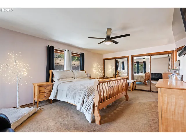 a bathroom with a tub and shower