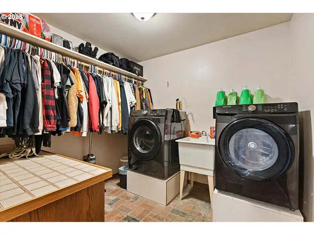 a bathroom with a toilet a sink and a shower