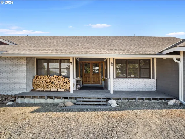 a view of a terrace with a garden